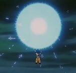 Goku rassemblant l'énergie de son Genki Dama contre Omega Shenron.