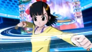 Note playing Super Dragon Ball Heroes at the Hero Stadium with the holographic screen behind showing her team battling against Froze's team in World Mission