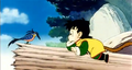 Gohan looking at a blue bird on a log