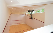 Indoor basketball court of Jimmy's House