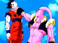 Super Buu holding a passed out Gohan