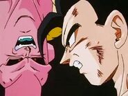 Super Buu grinning and laughing at Gohan and Kayla