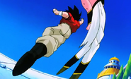 Super Buu bypasses Krillin's attack with his Body Manipulation