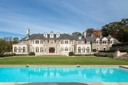 The swimming pool and spa back view of the Spencer House