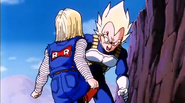 Android 18 knee kick Vegeta in the stomach