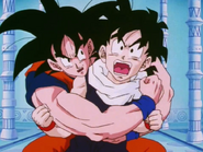 Gohan held back by Goku