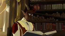 Kazi reading a book in the Great Bookery[3]