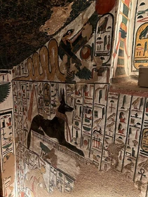 Wadjet depicted as a winged cobra found in the Tomb of Nefertari, shown above Anubis