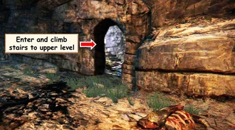 Fig 1: Enter the doorway in the side of the cliff and go up several flights of stairs exiting at the top.