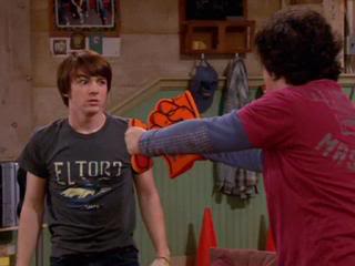 Drake and Josh recall a fight they had at a football game, then fight about...