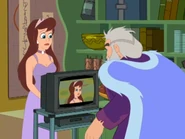 Clara showing her father the confessional on TV.