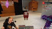 Phil looking at a Minecraft sheep that is dyed red and named "Enemy" in his hardcore world