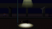 A hanged woman fallen dead under the lights