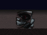 Third graffiti, looks like the eye, but in dark shades.