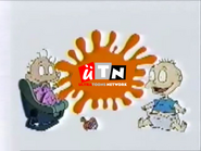 Tommy and Dil ident, 2013, This ident is based on the Nickelodeon bumper from 1999.
