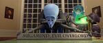 Megamind placing "Megamind, Evil Overlord" on the mayor's desk