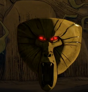 Golden baboon head