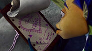 Oscar finds Angie's doodle, showing how much she loves him.