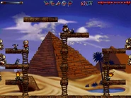 The secret is on the left side of the screen at the top of the third ladder.