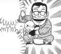 Kenta Kuraaku holds a baby in hostage