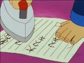 Tsukutsun is carefully ironing the wet letter.