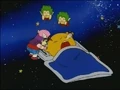 Arale is going to poke him and throw towards the Earth.
