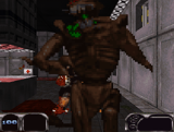 ProtectorDrone-DN64.png (73 KB) A Protector Drone in the extreme foreground in Duke Nukem 64, just before dying.