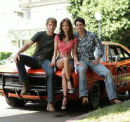 Bo, Daisy and Luke on the General Lee