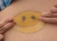 Fraida's smiley tattoo