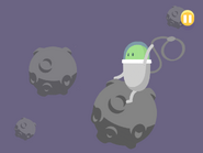 Numskull riding an asteroid from thier second minigame