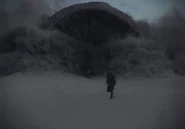 Paul running away from sandworm (Dune, 2021)