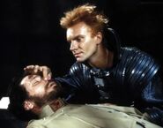 Feyd Rautha Harkonnen and the captive Leto