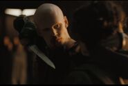 The Emperor's Blade at Paul's neck