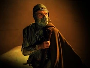 Paul in stillsuit, preparing for wormriding (Frank Herbert's Dune, 2000, Sci-Fi Channel).jpg (106 KB) Paul in stillsuit, holding Maker hooks, preparing for wormriding (Frank Herbert's Dune miniseries, 2000)