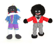 A picture revealing the similarities between a Black Pete ragdoll and a Golliwog doll.