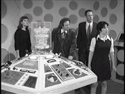 Barbara, , Ian, and Susan at the console.
