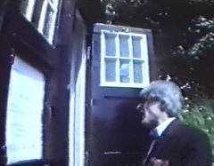 The Doctor prepares to step inside.