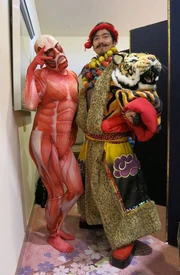Ogasawara in Kansai Yamamoto's  outfit (right) and  (left) at the 19th AMD Awards.