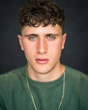 Elijah Holloway plays Harry Mitchell