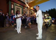 Billy holding the Olympic Torch