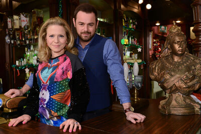 Mick&Linda behind bar