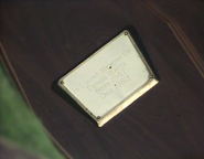 Plaque on Den Watts coffin (1 May 1990)