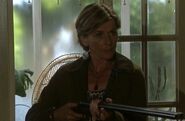 Gina holding a gun to Ian Beale (2007)
