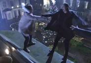 Lauren and Abi fall from the Queen Vic roof