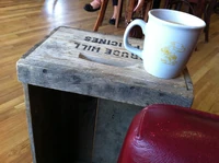 Let the stamps on the crate be rustic decoration.