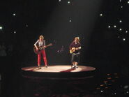 Ed performing with Taylor on Red Tour