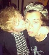 Ed kissing Harry's cheak