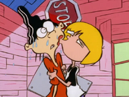 Nazz kissing Edd's cheek.