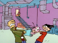 Ed and Edd trying to remove Eddy out of the bucket.