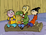 The Eds eating a box of Chunky Puffs.